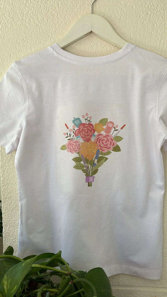camiseta con ramo de flores, bolis de insulina y glucómetros estampado en la espalda