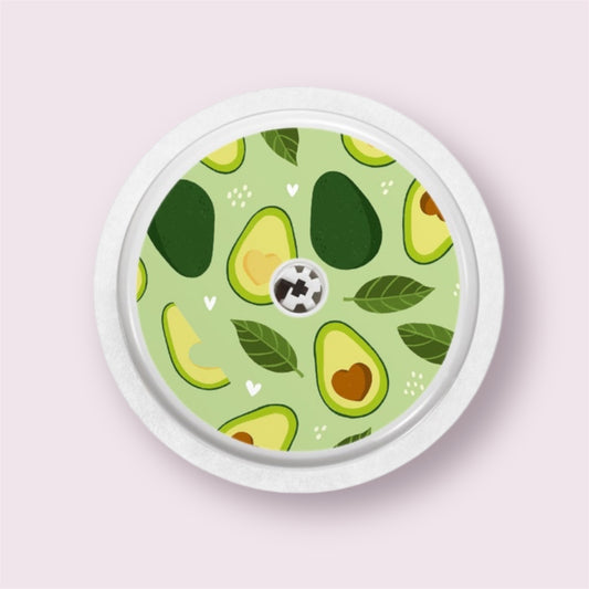 Sticker decorativo para sensor Freestyle 2 con ilustraciones de aguacates, corazones y hojas verdes sobre fondo claro