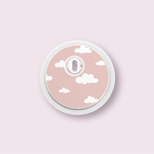 Sticker decorativo para sensor Freestyle 3 con fondo rosa claro y nubes blancas