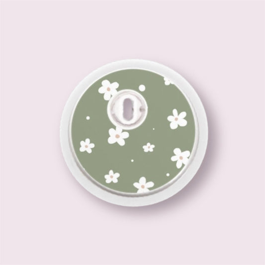 Sticker decorativo para sensor Freestyle 3 con margaritas blancas sobre fondo verde oliva