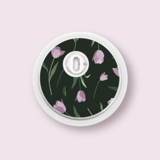 Sticker para sensor Freestyle 3 con tulipanes rosa y hojas verdes sobre fondo negro elegante